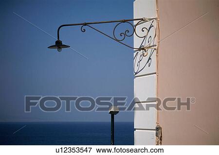 Stock Photo - House exterior and lamp. Fotosearch