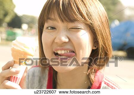 College student eating ice cream View Large Photo Image Stock Photo - College student eating ice cream. Fotosearch