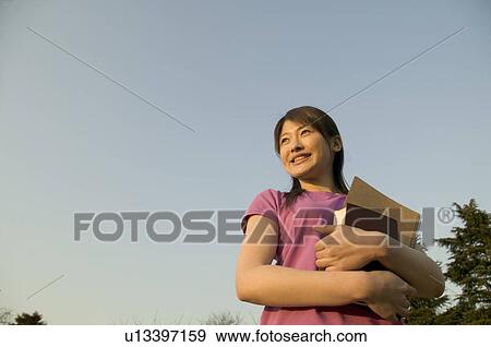 College student smiling View Large Photo Image Stock Photo - College student smiling. Fotosearch