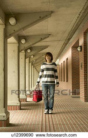 College student standing View Large Photo Image Stock Image - College student standing. Fotosearch