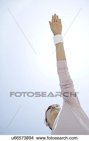 Young woman stretching View Large Photo Image Picture - Young woman stretching. Fotosearch