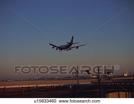 Airplane landing View Large Photo Image Stock Image - Airplane landing. Fotosearch