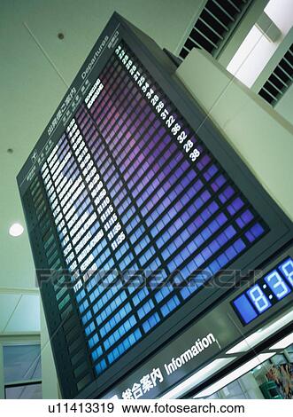 Arrival departure board at airport terminal View Large Photo Image Stock Photo - Arrival departure board at airport terminal. Fotosearch