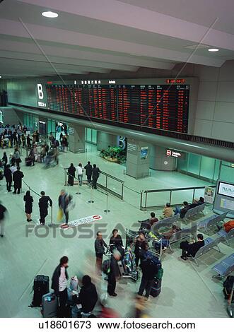 Busy airport terminal, blurred motion View Large Photo Image Stock Image - Busy airport terminal, blurred motion. Fotosearch