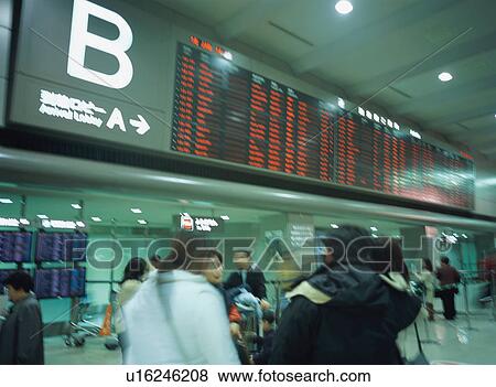 Stock Photo - Busy airport terminal, blurred motion. Fotosearch
