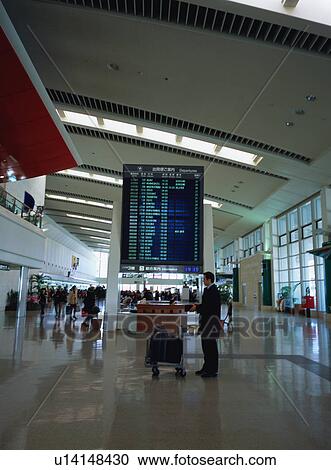 Busy airport terminal View Large Photo Image Stock Image - Busy airport terminal. Fotosearch