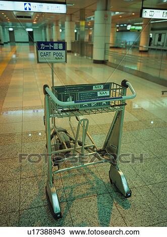Luggage cart at airport terminal View Large Photo Image Stock Image - Luggage cart at airport terminal. Fotosearch