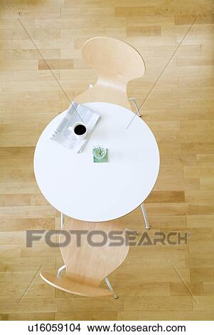 Table and two chairs, high angle view View Large Photo Image Picture - Table and two chairs, high angle view. Fotosearch