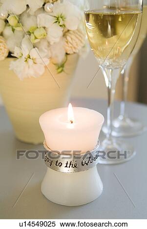 Candle and glasses of champagne View Large Photo Image Stock Photography - Candle and glasses of champagne. Fotosearch