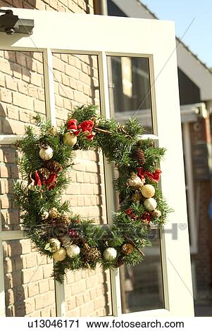 Christmas wreath on door View Large Photo Image Stock Image - Christmas wreath on door. Fotosearch