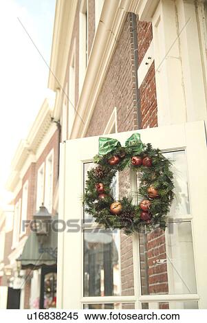 Christmas wreath on door View Large Photo Image Stock Photography - Christmas wreath on door. Fotosearch