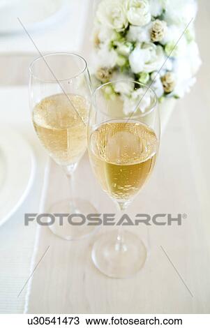 Glasses of champagne View Large Photo Image Stock Image - Glasses of champagne. Fotosearch