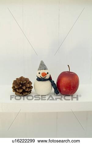 Snowman, pine cone and apple View Large Photo Image Stock Photo - Snowman, pine cone and apple. Fotosearch
