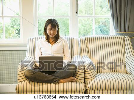 Young woman using computer View Large Photo Image Picture - Young woman using computer. Fotosearch