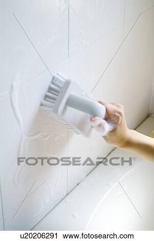 A woman cleaning bathroom View Large Photo Image Stock Image - A woman cleaning bathroom. Fotosearch