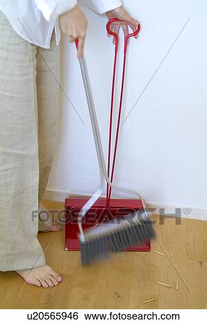 A woman cleaning floor View Large Photo Image Stock Photograph - A woman cleaning floor. Fotosearch