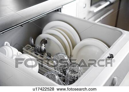 Plates in dishwasher View Large Photo Image Stock Photo - Plates in dishwasher. Fotosearch