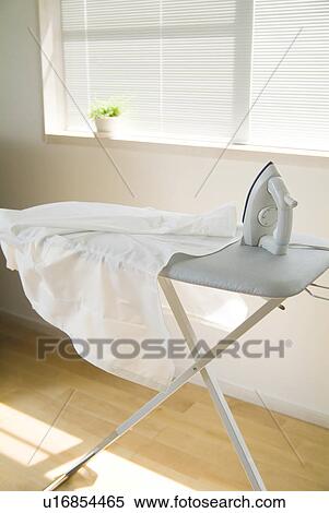Shirt on ironing board View Large Photo Image Stock Photography - Shirt on ironing board. Fotosearch