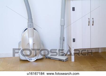 Picture - Vacuum cleaner and dresser. Fotosearch
