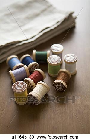 Various spools of thread View Large Photo Image Stock Photo - Various spools of thread. Fotosearch