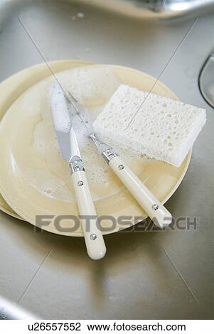 Washed dishes in kitchen sink View Large Photo Image Stock Image - Washed dishes in kitchen sink. Fotosearch