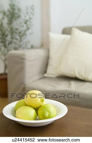 Stock Image - Lemons on table. Fotosearch
