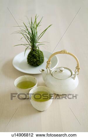 Stock Image - Mossball and green tea. Fotosearch