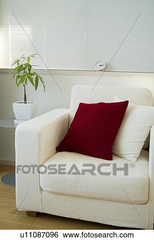 Potted plant and sofa View Large Photo Image Stock Photograph - Potted plant and sofa. Fotosearch