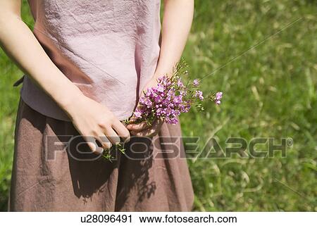 A woman wearing organic dyed clothes View Large Photo Image Stock Image - A woman wearing organic dyed clothes. Fotosearch