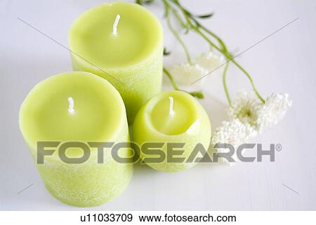 Candles and flower View Large Photo Image Stock Photo - Candles and flower. Fotosearch