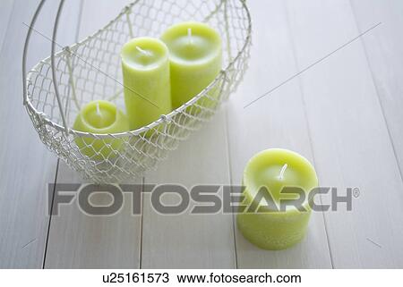 Candles in a basket View Large Photo Image Stock Image - Candles in a basket. Fotosearch