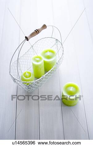 Candles in a basket View Large Photo Image Stock Photograph - Candles in a basket. Fotosearch