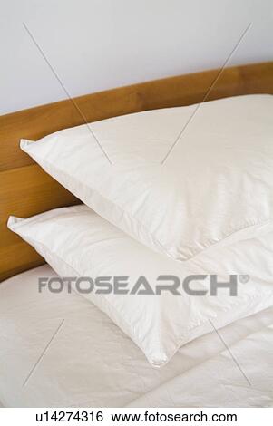 Pillows on bed View Large Photo Image Stock Photograph - Pillows on bed. Fotosearch