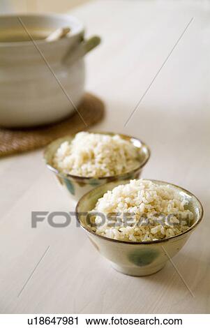Steamed brown rice in rice bowls View Large Photo Image Stock Image - Steamed brown rice in rice bowls. Fotosearch