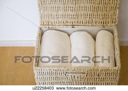 Towels in a basket View Large Photo Image Stock Image - Towels in a basket. Fotosearch