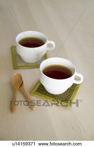 Stock Image - Two cups of tea. Fotosearch