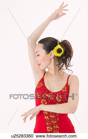 Young woman dancing salsa View Large Photo Image Stock Image - Young woman dancing salsa. Fotosearch