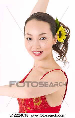 Stock Photo - Young woman dancing salsa. Fotosearch