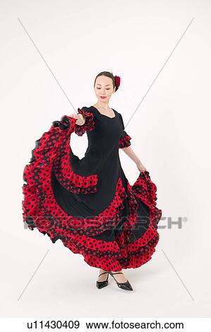 Young woman dancing the flamenco View Large Photo Image Stock Photo - Young woman dancing the flamenco. Fotosearch