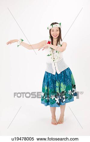Young woman dancing the hula View Large Photo Image Stock Photography - Young woman dancing the hula. Fotosearch
