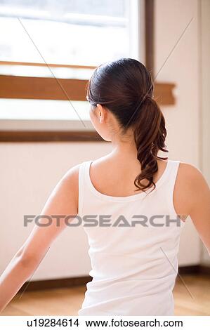Young woman exercising View Large Photo Image Picture - Young woman exercising. Fotosearch