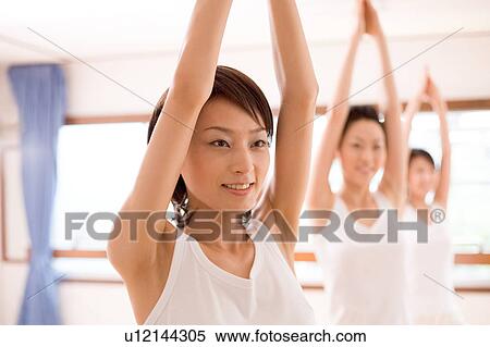 Young women doing Yoga View Large Photo Image Stock Photography - Young women doing Yoga. Fotosearch