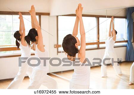 Young women doing Yoga View Large Photo Image Stock Photography - Young women doing Yoga. Fotosearch