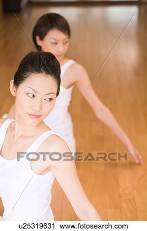 Young women exercising View Large Photo Image Stock Image - Young women exercising. Fotosearch