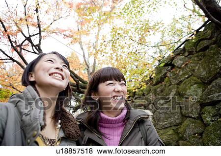 Two young women looking up, Ohara Sanzenin Temple, Kyoto Prefecture, Japan View Large Photo Image Stock Photo - Two young women looking up, Ohara Sanzenin Temple, Kyoto Prefecture, Japan. Fotosearch