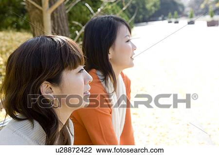 Two young women View Large Photo Image Stock Image - Two young women. Fotosearch