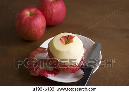 Stock Image - Apples and knife. Fotosearch