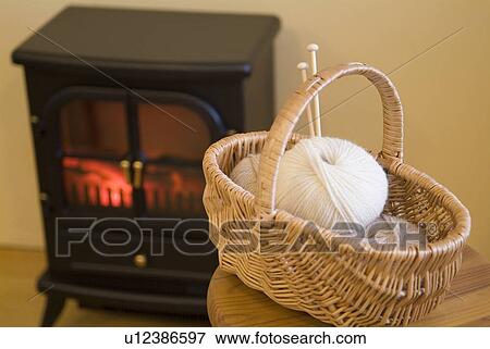 Stock Photo - Balls of wool in basket. Fotosearch