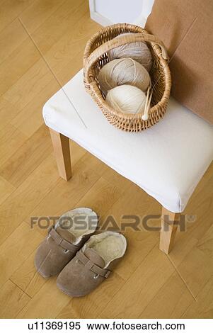Basket of wool on chair View Large Photo Image Stock Photography - Basket of wool on chair. Fotosearch