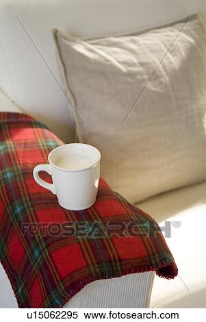 Cup of milk on sofa View Large Photo Image Stock Photography - Cup of milk on sofa. Fotosearch